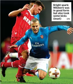  ?? EPA ?? Bright spark: Wilshere was in good form but also took some kicks (inset)