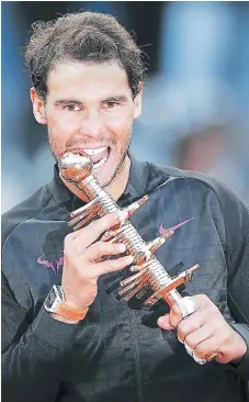  ?? FOTO: AFP ?? Nadal se mostró aeliz tras conquistar nor quinta vez el madrid Onen, “gracias nor el anoyo que recibí estos días”. raaael Nadal