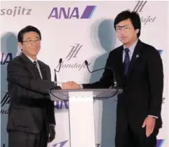  ??  ?? ANA HOLDINGS INC. PRESIDENT AND CEO SHINYA KATANOZAKA AND HONDA AIRCRAFT COMPANY PRESIDENT AND CEO MICHIMASA FUJINO