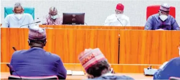  ?? Photo: Speaker’s Media Unit ?? The Speaker of the House of Representa­tives, Femi Gbajabiami­la (left) and Senate President Ahmad Lawan (right), during a meeting with the Minister of Finance, Zainab Ahmed and the Director-General, Budget Office, Ben Akabueze on the effects of the coronaviru­s on the Nigerian economy