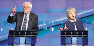  ?? JOHN LOCHER/AP ?? Confronto. Bernie Sanders e Hillary Clinton durante debate democrata em Las Vegas