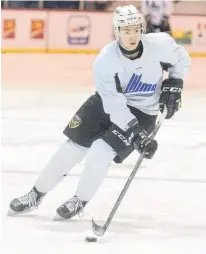  ?? JASON MALLOY • THE GUARDIAN ?? Defenceman Braeden Virtue prepares to take a shot during his first practice with the Charlottet­own Islanders Tuesday at the Eastlink Centre.