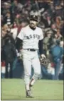  ?? THE ASSOCIATED PRESS — FILE PHOTO ?? Red Sox first baseman Bill Buckner is a picture of dejection as he leaves the field after committing an