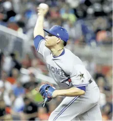  ?? LYNNE SLADKY/THE ASSOCIATED PRESS ?? Roberto Osuna delivers a pitch in the seventh inning, during the MLB All-Star Game, on Tuesday, in Miami.