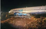  ?? Photo: Xinhua ?? A Boeing 737-300 jet after it skidded off the runway on Thursday in the Senegal capital, Dakar, injuring 11 people, four seriously.