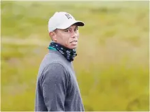  ?? AP-Yonhap ?? Tiger Woods stands on the putting green during practice for the PGA Championsh­ip golf tournament at TPC Harding Park in San Francisco, Tuesday.