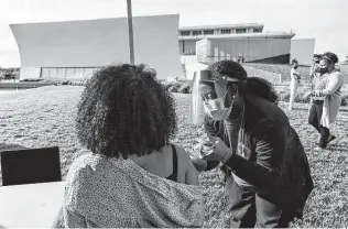  ?? Jacquelyn Martin / Associated Press ?? Nurse Kendria Brown vaccinates a woman Thursday in Washington, D.C. Many states are requesting the Biden administra­tion send them only a fraction of what’s been allocated to them.