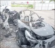  ?? NTSB VIA AP ?? This image provided by the National Transporta­tion Safety Board shows damage to a 2021 Tesla Model 3 Long Range Dual Motor electric car following a crash in September.