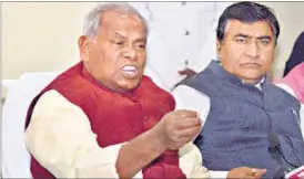  ??  ?? Bihar chief minister Jitan Ram Manjhi (left), on Friday, accused JD(U) leader Nitish Kumar of horsetradi­ng and threatenin­g party MLAs to vote for him. PTI PHOTO