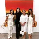  ??  ?? Beautiful artwork attracts beautiful ladies #artfair #ArtStageSi­ngapore