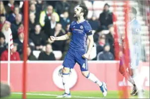  ?? OLI SCARFF/AFP ?? Chelsea midfielder Cesc Fabregas celebrates scoring in the English Premier League match against Sunderland at the Stadium of Light on Wednesday night.
