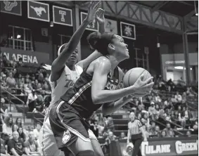  ?? SCOTT THRELKELD/AP PHOTO ?? UConn’s Azura Stevens drives past Tulane’s Krystal Freeman (23) for a basket during the No. 1 Huskies’ 91-47 victory on Wednesday night in New Orleans.