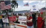  ?? ALEX BRANDON — ASSOCIATED PRESS ?? Supporters of President Donald Trump gather outside Mara-Lago in Palm Beach, Fla., on Saturday.