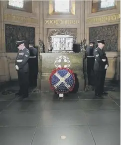  ??  ?? The Scottish National War Memorial, main; an honour guard by the casket containing the names of all those who died, above; a stained glass window, above right; one of Sir Robert Lorimer’s drawings of the memorial