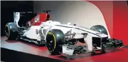  ??  ?? The 2018 Alfa Romeo Sauber Formula One Team liveried racecar.