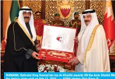  ?? - KUNA photos ?? MANAMA: Bahrainin King Hamad bin Isa Al-Khalifa awards HH the Amir Shelkh Misha Al-Ahmad Al-Jaber Al-Sabah the Order of Shelkh Isa bin Salman Al-Khalifa and the Bahraini Sword after official talks at Sakhir Palaoe during the Amir's state visit on Feb 13, 2024.