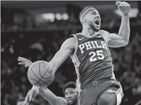  ?? SETH WENIG/AP PHOTO ?? In this Jan. 13 file photo, Ben Simmons of the Philadelph­ia 76ers reacts after dunking in a game against the New York Knicks in New York.