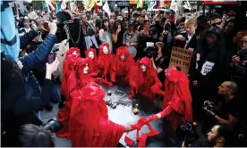  ??  ?? Extinction Rebellion’s protest outside a fashion week venue in London. Photograph: Henry Nicholls/Reuters