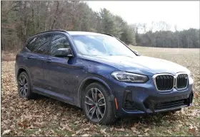  ?? MARC GRASSO/MEDIA NEWS GROUP — BOSTON HERALD ?? The BMW X3M40i is elegance for the whole family, with comfortabl­e heated seats front and back, a heated steering wheel, a smooth, quiet six-cylinder engine and companion hybrid motor.