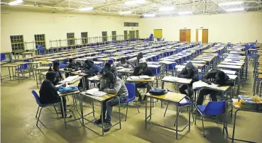  ?? Picture: Phill Magakoe ?? Some matrics at Moses Mnisi High School worked hard for the 2017 finals, camping at the school to study.