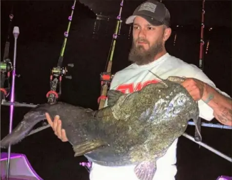  ?? Jessie St. Espri ?? Jessie St. Espri of Ambridge, Beaver County, with a 41.2-pound flathead catfish caught on the Ohio River.