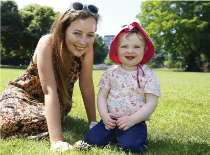  ??  ?? Far left, Jeanette Hood and Annabelle (2) in Herbert Park, Dublin. Photo: Damien Eagers. Bottom left, fishing on the River Moy in Ballina, Co Mayo. Photo: Steve Humphreys. Left, Margarita Shikalova and Julia Mirouse both from Russia living in Sandymount enjoy a picnic on Sandymount Strand. Photo: Justin farrelly. Inset: Sophie O’Reilly (12) with her dog Bimbo Photos: Gareth Chaney