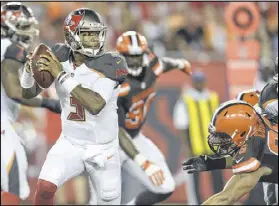  ?? JASON BEHNKEN / AP ?? Tampa Bay quarterbac­k Jameis Winston completed 16 of 25 passes for 259 yards and two touchdowns Friday in the first half of the Bucs’ 30-13 preseason romp over the Browns.