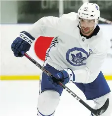  ?? DAVEABEL ?? Newly acquired Toronto Maple Leafs centre John Tavares participat­es in a workout at the Mastercard Centre in Toronto on Wednesday.