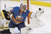  ?? JASON DECROW — THE ASSOCIATED PRESS ?? New York Islanders goalie Semyon Varlamov had 27 saves against the Boston Bruins for his 29th career shutout.