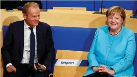  ??  ?? Donald Tusk y Angela Merkel en la Fundación Konrad Adenauer.