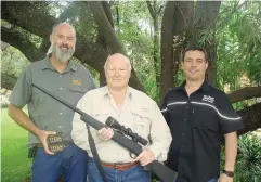  ??  ?? From left to right: Bernard Classen of Helber, sponsor of the Titan bullets and the impala hunt; Clive Aitchison, winner of the competitio­n; and Jan Lubbe owner of Sons of Guns, sponsor of the rifle, scope and other accessorie­s.