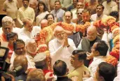  ?? PRITAM BANDYOPADH­YAY ?? PM Narendra Modi being greeted by BJP MPs during BJP Parliament­ary party meeting at Parliament House, in New Delhi on Tuesday. —
