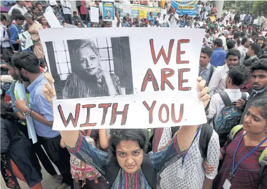  ??  ?? SPEAKING OUT: Members of different non-government­al organistat­ion, students and social activists condemn the attack on journalist Gauri Lankesh.