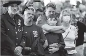  ?? CHIP SOMODEVILL­A Getty Images ?? Family members and loved ones of Stuart Todd Meltzer attend the annual 9/11 Commemorat­ion Ceremony at the National 9/11 Memorial and Museum on Saturday in New York City.