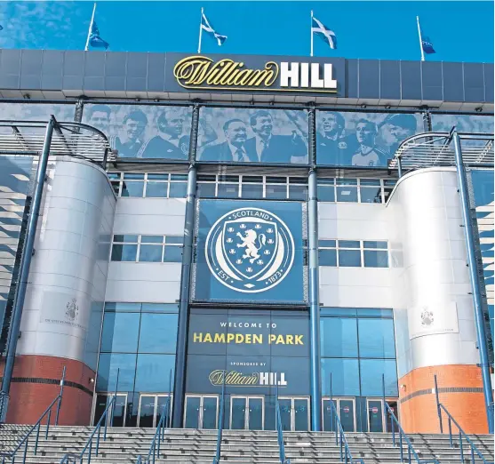  ?? Picture: SNS. ?? Hampden Park will remain home to Scotland internatio­nals and cup finals after the SFA agreed to buy the stadium.