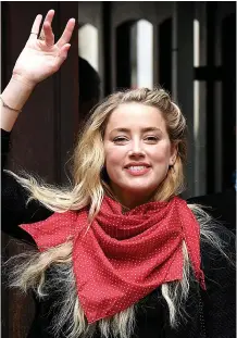  ??  ?? ‘So much glass’...Amber Heard outside court yesterday