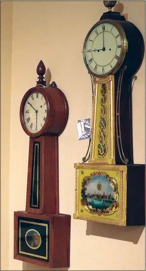  ??  ?? These are a couple of the antique clocks LaBounty has in his collection.