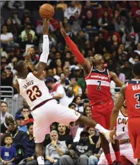  ?? File photo ?? LeBron James (23) is one of the leading contenders for the NBA MVP award along with James Harden and Boston’s Kyrie Irving a quarter of the way through the season.