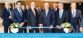  ?? ?? GENE A: Isam Al-Sager, Faisal Al- amad and Malek Khalife as well as members of the Board of Directors and bank employees in Swit erland during the inaugurati­on of the new headquarte­rs.