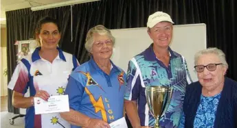  ?? Photo: Contribute­d ?? TOP TEAM: Dawn James (right) congratula­tes DDLBA triples competitio­n winners (from left) Letitia Weir, Imelda Brumpton and Tracy Foster.