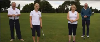  ??  ?? Seán Furlong (Captain), Pat Purcell (lady C aptain), Lillian O’Hanlon and Harry Reinhardt taking part in the summer mixed nine-hole competitio­n in New Ross.