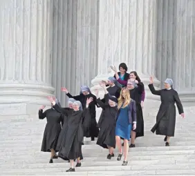  ?? AFP/GETTY IMAGES ?? Little Sisters of the Poor nuns at Supreme Court in 2016.