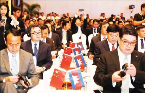  ?? PHA LINA ?? Delegates await a presentati­on at the Cambodia-China Business and Financial Developmen­t Forum yesterday in Phnom Penh.