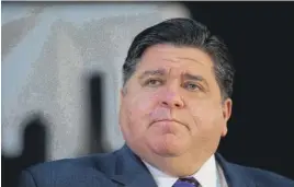  ?? PAT NABONG/SUN-TIMES FILE ?? Gov. J.B. Pritzker has said, “We won’t hesitate to tighten restrictio­ns to protect our communitie­s.”