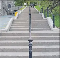  ?? LOUIS POWER/THE TELEGRAM ?? It’s a steep climb to get from Water Street to Duckworth Street in downtown St. John’s.