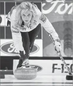  ?? Canadian Press photo ?? Canada skip Jennifer Jones delivers a shot as they face Germany at the World Women's Curling Championsh­ip in North Bay, Ont., Sunday.