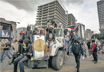  ??  ?? Declaració­n. Venezolano­s opositores participar­on en otra manifestac­ión esta semana en Caracas.