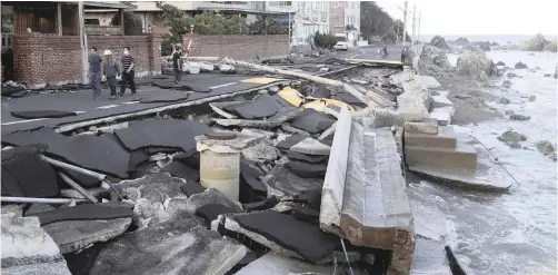  ??  ?? A COASTAL road damaged when Typhoon Haishen hit Ulsan, South Korea, yesterday. The typhoon also destroyed or sank about 80 fishing boats and destroyed more than 100 houses. | AP