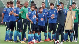  ?? PTI ?? Brazilian players with coach during a practice session in Kolkata ahead of the quarterfin­al. —