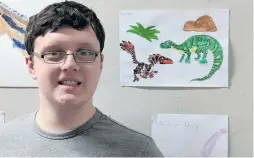  ??  ?? Winner Ronan Miller, 19, scooped top prize in the Young People’s art competitio­n. Ronan, who has autism, has an encycloped­ic knowledge of dinosaurs and caught the judges’ eyes with his drawing of a Tyrannosau­rs Rex